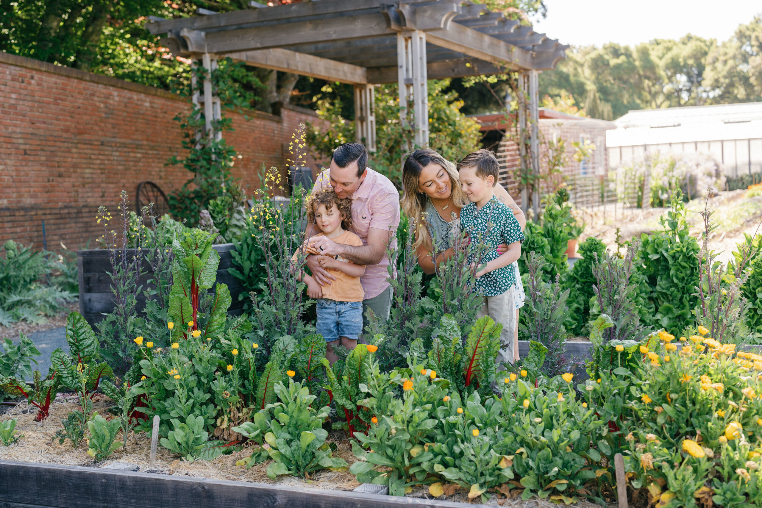 Family overlooking Vegetable Garden
